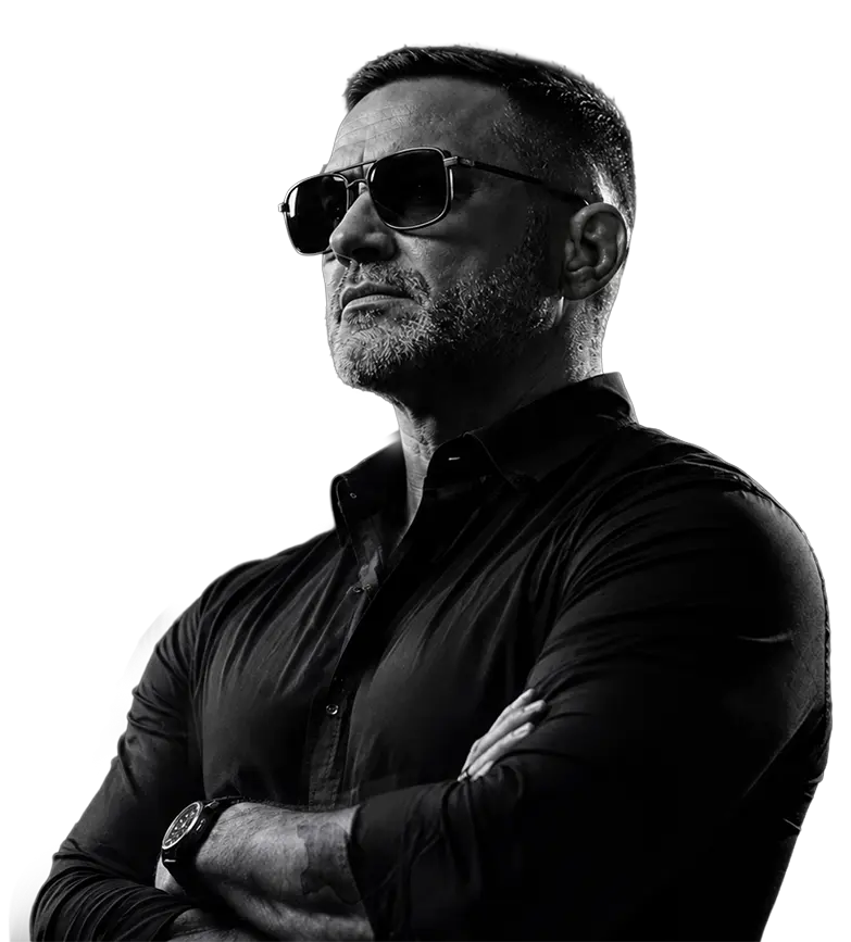 Tobin Dorn in black and white with crossed arms