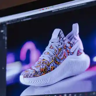 Footwear concept rendered on a studio monitor