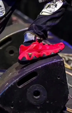 Red footwear action detail
