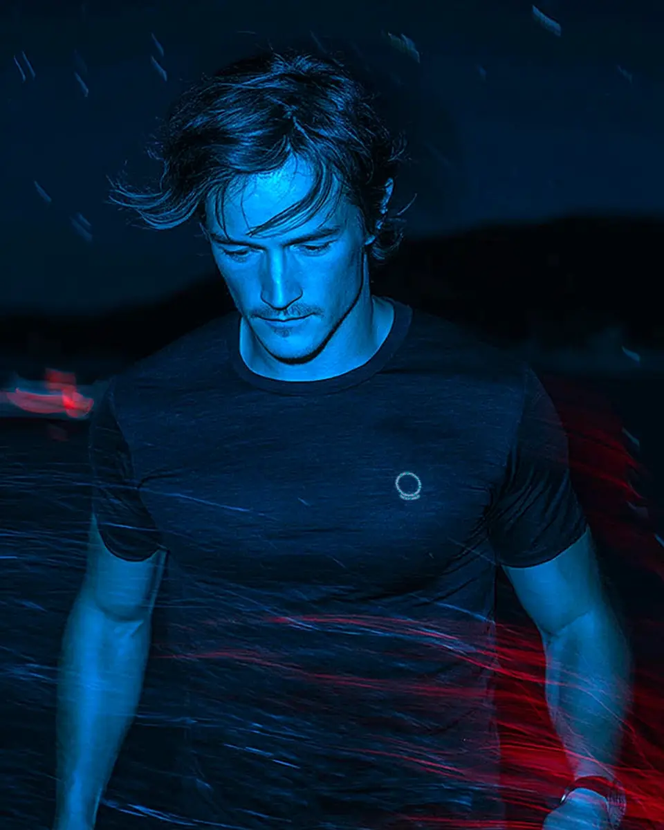 Blue-lit portrait in motion